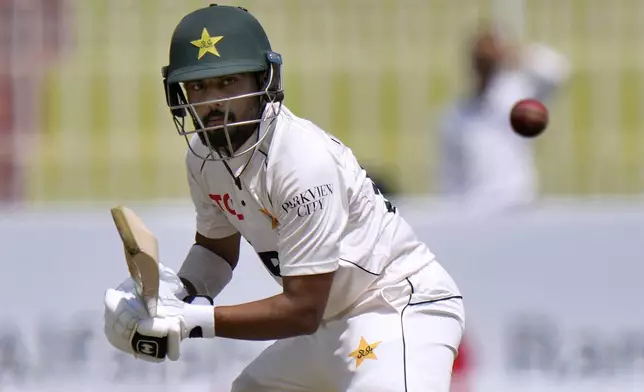 Pakistan's Saud Shakeel plays a shot during the second day of first cricket test match between Pakistan and Bangladesh, in Rawalpindi, Pakistan, Thursday, Aug. 22, 2024. (AP Photo/Anjum Naveed)