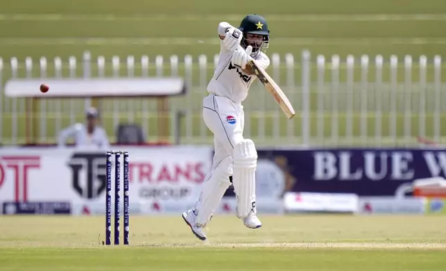 Pakistan's Saud Shakeel plays a shot during the second day of first cricket test match between Pakistan and Bangladesh, in Rawalpindi, Pakistan, Thursday, Aug. 22, 2024. (AP Photo/Anjum Naveed)