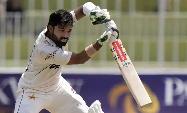 Pakistan's Mohammad Rizwan plays a shot during the second day of first cricket test match between Pakistan and Bangladesh, in Rawalpindi, Pakistan, Thursday, Aug. 22, 2024. (AP Photo/Anjum Naveed)