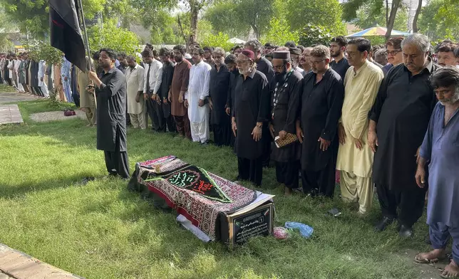 People attend funeral prayer of a Shiite Muslims pilgrim, who was killed in the bus crash in Iran while heading to Iraq for a pilgrimage, in Larkana, Pakistan, Saturday, Aug. 24, 2024. (AP Photo/Muhammad Usama)