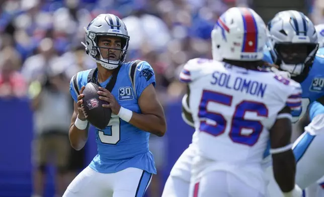 Carolina Panthers quarterback Bryce Young (9) drops back to pass in the first half of an NFL preseason football game against the Buffalo Bills, Saturday, Aug. 24, 2024, in Orchard Park, N.Y. (AP Photo/Charles Krupa)