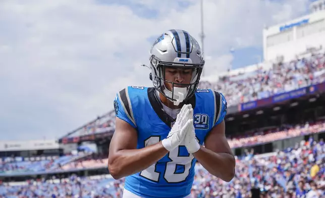 Carolina Panthers wide receiver Jalen Coker (18) celebrates his touchdown in the second half of an NFL preseason football game against the Buffalo Bills, Saturday, Aug. 24, 2024, in Orchard Park, N.Y. (AP Photo/Charles Krupa)