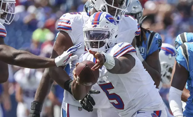 Buffalo Bills quarterback Anthony Brown Jr. (5) celebrates his first down in the second half of an NFL preseason football game against the Carolina Panthers, Saturday, Aug. 24, 2024, in Orchard Park, N.Y. (AP Photo/Jeffrey T. Barnes)