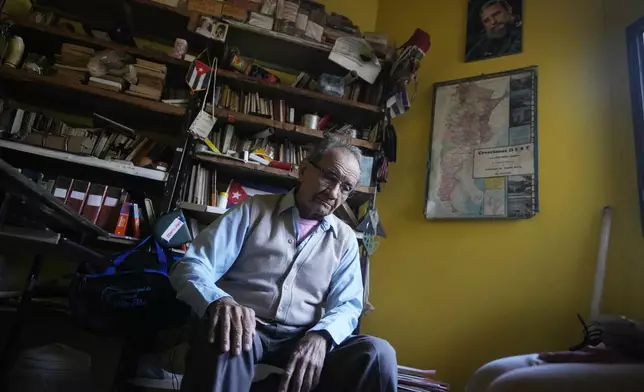 Emilio Barreto, who was imprisoned without charge for 13 years under Gen. Alfredo Stroessner's dictatorship, pauses during an interview at his home in Lambare, Paraguay, Wednesday, Aug. 14, 2024. (AP Photo/Jorge Saenz)