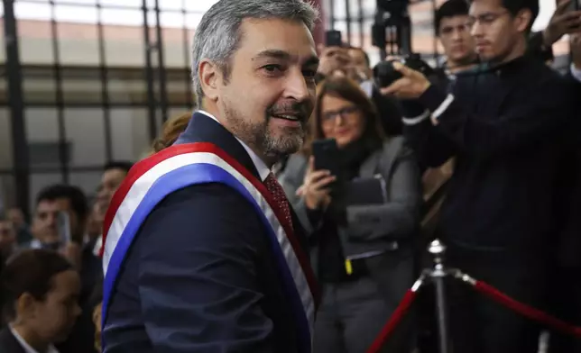 FILE - Paraguay's President Mario Abdo Benitez arrives to Congress in Asuncion, Paraguay, July 1, 2019. (AP Photo/Jorge Saenz, File)