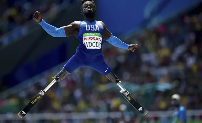 Regas Woods, of the United States, competes in the men's long jump T42 final, during the Paralympic Games, at the Olympic Stadium, in Rio de Janeiro, Brazil, Sept. 17, 2016. (AP Photo/Mauro Pimentel)