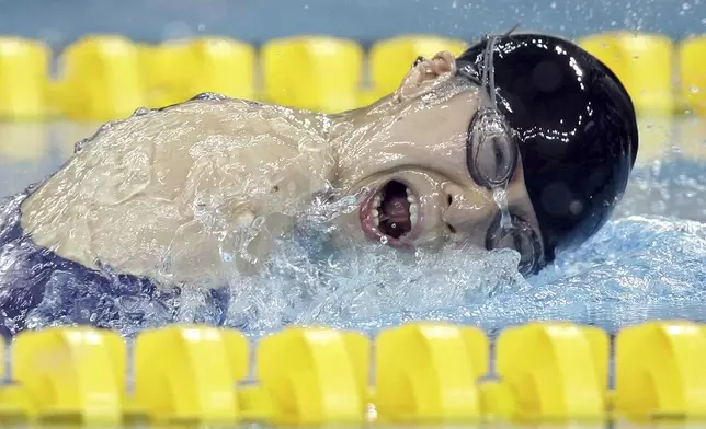 China's Jiang Fuying swims on her way to a silver medal in the Women's 200 meters Individual Medley SM6 final at the 2008 Beijing Paralympic Games in Beijing, Sept. 7, 2008. (AP Photo/Greg Baker)