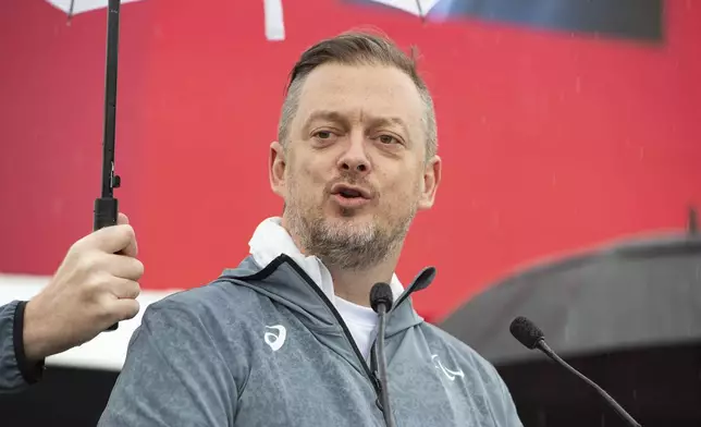 International Paralympic Committee (IPC) President Andrew Parsons delivers a speech during the lighting of the Paralympic Flame in Stoke Mandeville, widely considered the birthplace of the Paralympic Games, England, Saturday, Aug. 24, 2024. (AP Photo/Thomas Krych)