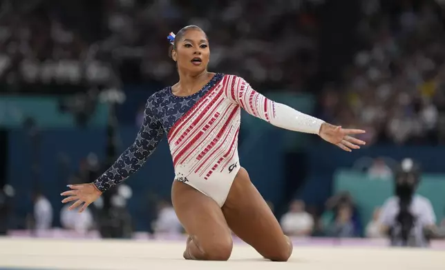 Jordan Chiles, of the United States, performs on the floor during the women's artistic gymnastics team finals round at Bercy Arena at the 2024 Summer Olympics, Tuesday, July 30, 2024, in Paris, France. (AP Photo/Charlie Riedel)