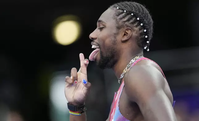 Noah Lyles, of the United States, competes during the men's 200-meter semifinal at the 2024 Summer Olympics, Wednesday, Aug. 7, 2024, in Saint-Denis, France. (AP Photo/Bernat Armangue)