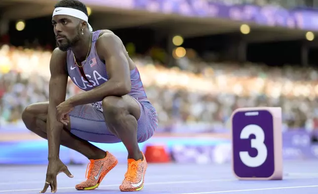 Kenneth Bednarek, of the United States, prepares for a heat in the men's 200-meter at the 2024 Summer Olympics, Monday, Aug. 5, 2024, in Saint-Denis, France. (AP Photo/Bernat Armangue)