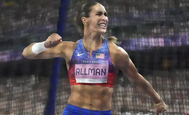 Valarie Allman, of the United States, celebrates after winning the women's discus throw final at the 2024 Summer Olympics, Monday, Aug. 5, 2024, in Saint-Denis, France.(AP Photo/Matthias Schrader)