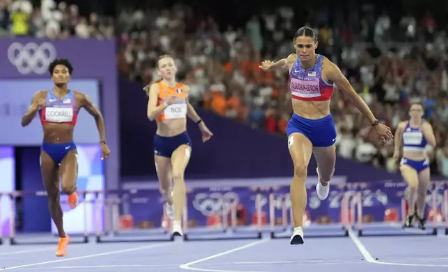 Sydney McLaughlin-Levrone, of the United States, wins the women's 400-meters hurdles final at the 2024 Summer Olympics, Thursday, Aug. 8, 2024, in Saint-Denis, France. (AP Photo/Petr David Josek)