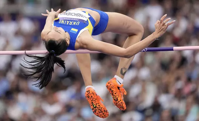 Iryna Gerashchenko, of Ukraine, competes in the women's high jump final at the 2024 Summer Olympics, Sunday, Aug. 4, 2024, in Saint-Denis, France. (AP Photo/Matthias Schrader)