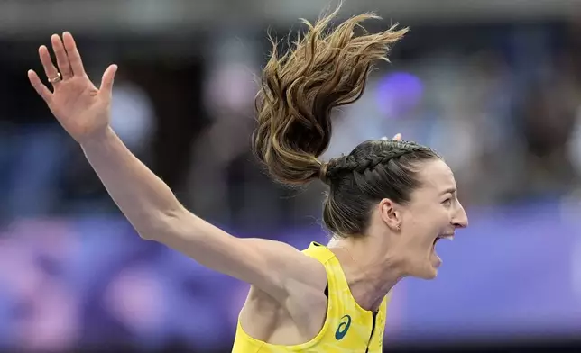 Nicola Olyslagers, of Australia, reacts in the women's high jump final at the 2024 Summer Olympics, Sunday, Aug. 4, 2024, in Saint-Denis, France. (AP Photo/Matthias Schrader)