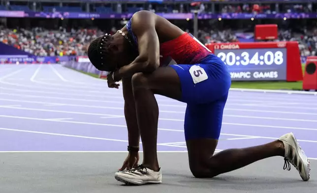 Noah Lyles, of the United States, reacts following the men's 200-meters final at the 2024 Summer Olympics, Thursday, Aug. 8, 2024, in Saint-Denis, France.(AP Photo/Petr David Josek)
