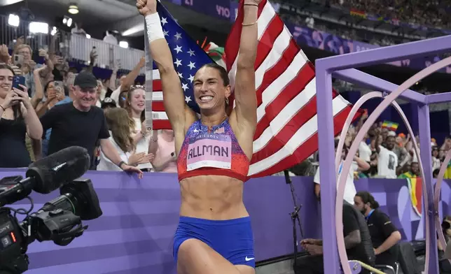 Valarie Allman, of the United States, celebrates after winning the women's discus throw final at the 2024 Summer Olympics, Monday, Aug. 5, 2024, in Saint-Denis, France.(AP Photo/Matthias Schrader)
