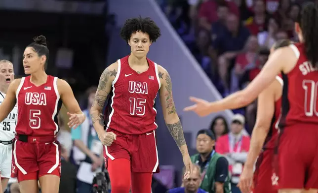 United States' Brittney Griner, center, reacts after being fouled during a women's basketball game against Belgium at the 2024 Summer Olympics, Thursday, Aug. 1, 2024, in Villeneuve-d'Ascq, France. (AP Photo/Michael Conroy)