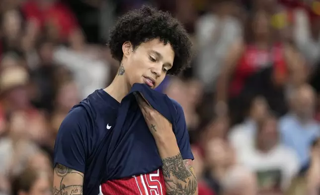 United States' Brittney Griner, center, stands on the court prior to a women's basketball game against Belgium at the 2024 Summer Olympics, Thursday, Aug. 1, 2024, in Villeneuve-d'Ascq, France. (AP Photo/Michael Conroy)