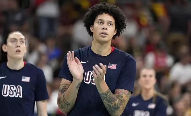 United States' Brittney Griner, center, stands on the court prior to a women's basketball game against Belgium at the 2024 Summer Olympics, Thursday, Aug. 1, 2024, in Villeneuve-d'Ascq, France. (AP Photo/Michael Conroy)