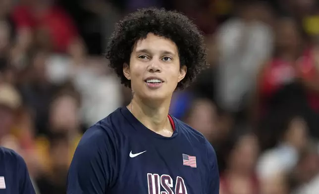 United States' Brittney Griner, center, stands on the court prior to a women's basketball game against Belgium at the 2024 Summer Olympics, Thursday, Aug. 1, 2024, in Villeneuve-d'Ascq, France. (AP Photo/Michael Conroy)