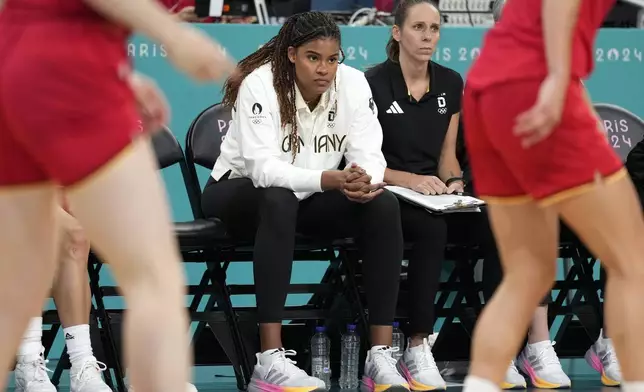 Germany's Nyara Sabally sits on the bench during a women's basketball game against Japan at the 2024 Summer Olympics, Thursday, Aug. 1, 2024, in Villeneuve-d'Ascq, France. (AP Photo/Michael Conroy)