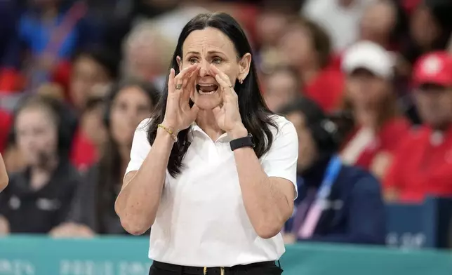 Australia head coach Sandy Brondello yells to her team during a women's basketball game against Canada at the 2024 Summer Olympics, Thursday, Aug. 1, 2024, in Villeneuve-d'Ascq, France. (AP Photo/Michael Conroy)