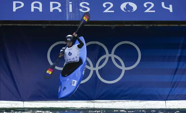 Monica Doria Vilarrubla of Andorra competes in the women's kayak cross time trial at the 2024 Summer Olympics, Friday, Aug. 2, 2024, in Vaires-sur-Marne, France. (AP Photo/Kirsty Wigglesworth)