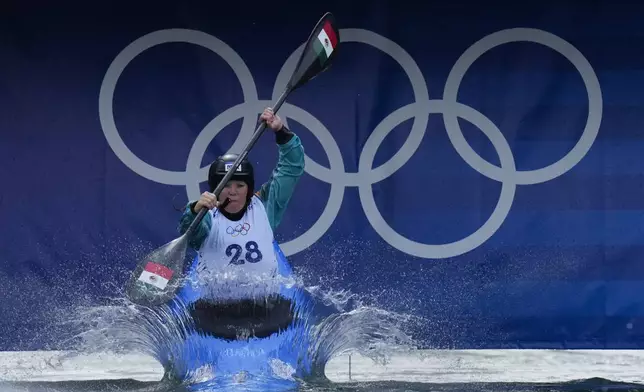 Sofia Reinoso of Mexico competes in the women's kayak cross time trial at the 2024 Summer Olympics, Friday, Aug. 2, 2024, in Vaires-sur-Marne, France. (AP Photo/Kirsty Wigglesworth)