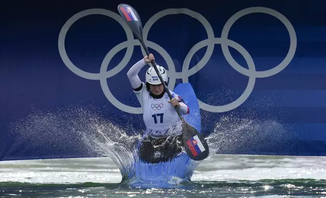 Zuzana Pankova of Slovakia competes in the women's kayak cross time trial at the 2024 Summer Olympics, Friday, Aug. 2, 2024, in Vaires-sur-Marne, France. (AP Photo/Kirsty Wigglesworth)