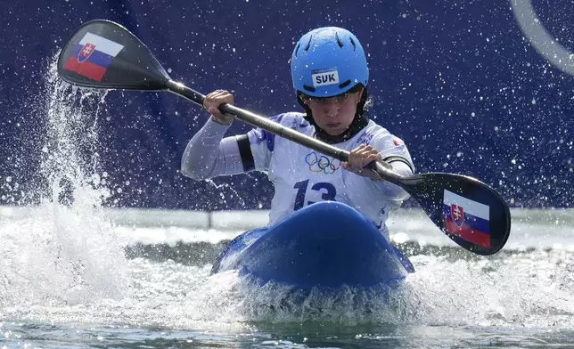 Eliska Mintalova of Slovakia competes in the women's kayak cross time trial at the 2024 Summer Olympics, Friday, Aug. 2, 2024, in Vaires-sur-Marne, France. (AP Photo/Kirsty Wigglesworth)