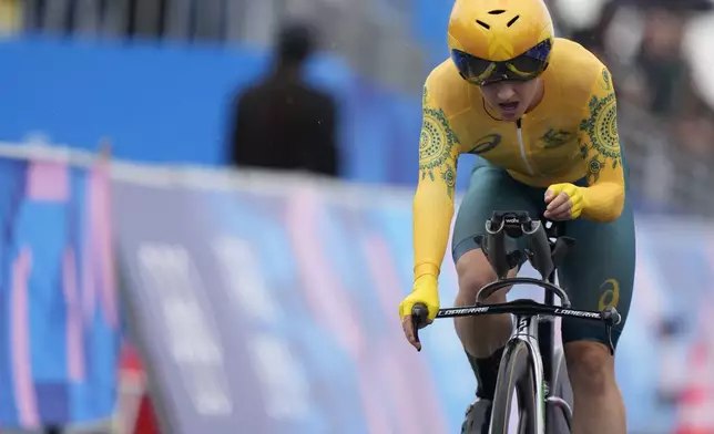 Grace Brown, of Australia, competes in the women's cycling time trial event, at the 2024 Summer Olympics, Saturday, July 27, 2024, in Paris, France. (AP Photo/Ricardo Mazalan)