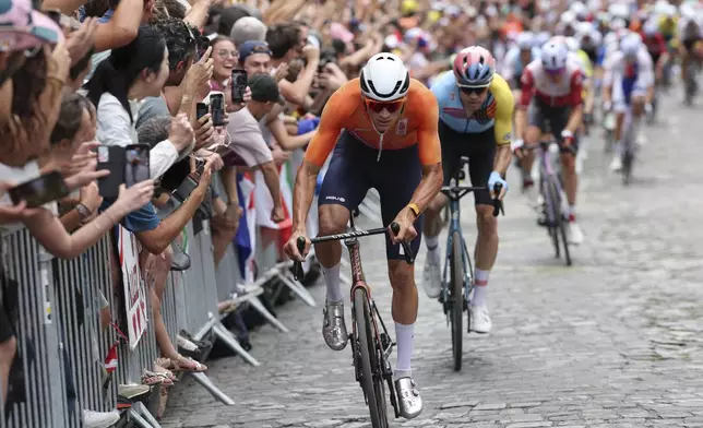 Mathieu Van Der Poel, of the Netherlands, pedals during the men's road cycling event, at the 2024 Summer Olympics, Saturday, Aug. 3, 2024, in Paris, France. (Tim de Waele/Pool Photo via AP)