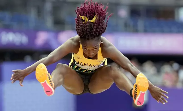 Chanice Porter, of Jamaica, competes during the women's long jump qualification at the 2024 Summer Olympics, Tuesday, Aug. 6, 2024, in Saint-Denis, France. (AP Photo/Bernat Armangue)