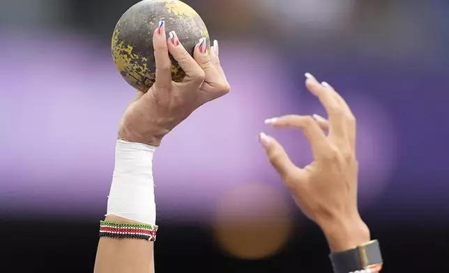 Taliyah Brooks, of the United States, competes during the women's heptathlon shot put at the 2024 Summer Olympics, Thursday, Aug. 8, 2024, in Saint-Denis, France. (AP Photo/Matthias Schrader)