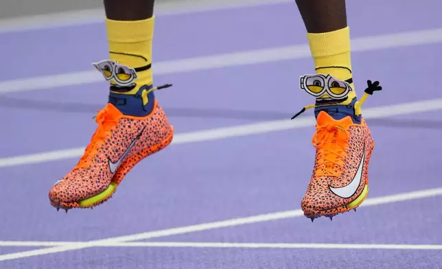 Tarsis Gracious Orogot, of Uganda, competes during the men's 200-meter semifinal at the 2024 Summer Olympics, Wednesday, Aug. 7, 2024, in Saint-Denis, France. (AP Photo/Bernat Armangue)