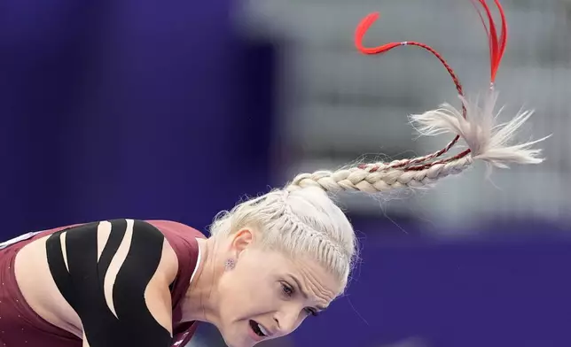 Lina Muze-Sirma, of Latvia, competes during the women's javelin throw qualification at the 2024 Summer Olympics, Wednesday, Aug. 7, 2024, in Saint-Denis, France. (AP Photo/Matthias Schrader)