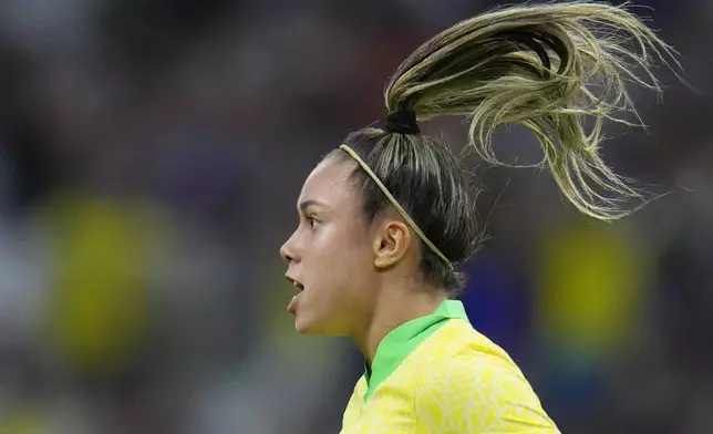 Brazil's Priscila celebrates after Spain's Irene Paredes scored an own goal during a women's semifinal soccer match between Brazil and Spain at the 2024 Summer Olympics, Tuesday, Aug. 6, 2024, at Marseille Stadium in Marseille, France. (AP Photo/Julio Cortez)