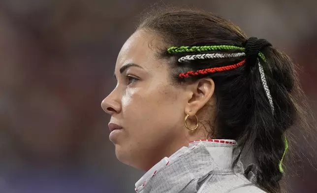 Italy's Alice Volpi stands during the women's team foil quarterfinal match against Egypt during the 2024 Summer Olympics at the Grand Palais, Thursday, Aug. 1, 2024, in Paris, France. (AP Photo/Rebecca Blackwell)