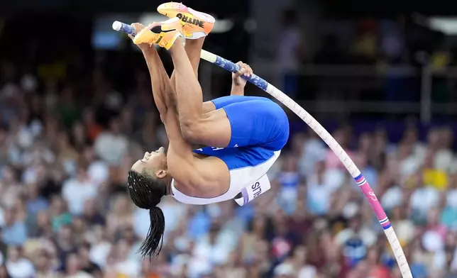 Emmanouil Karalis, of Greece, competes during the men's pole vault final at the 2024 Summer Olympics, Monday, Aug. 5, 2024, in Saint-Denis, France. (AP Photo/Matthias Schrader)