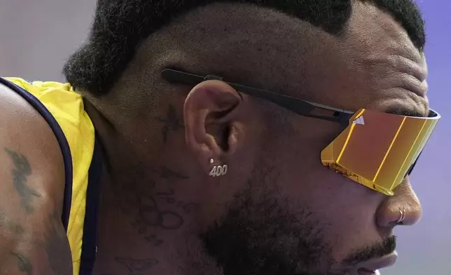 Anthony Jose Zambrano, of Colombia, gets ready to start in a men's 400 meters round 1 heat at the 2024 Summer Olympics, Sunday, Aug. 4, 2024, in Saint-Denis, France. (AP Photo/Ashley Landis)