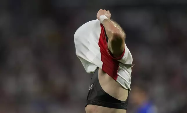 Egypt's Zizo reacts after missing an opportunity to score during the men's semifinal soccer match between France and Egypt, at Lyon Stadium, during the 2024 Summer Olympics, Monday, Aug. 5, 2024, in Decines, France. (AP Photo/Silvia Izquierdo)