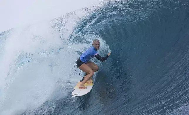 Tatiana Weston-Webb, of Brazil, surfs during the gold medal match of the surfing competition at the 2024 Summer Olympics, Monday, Aug. 5, 2024, in Teahupo'o, Tahiti. (AP Photo/Gregory Bull)