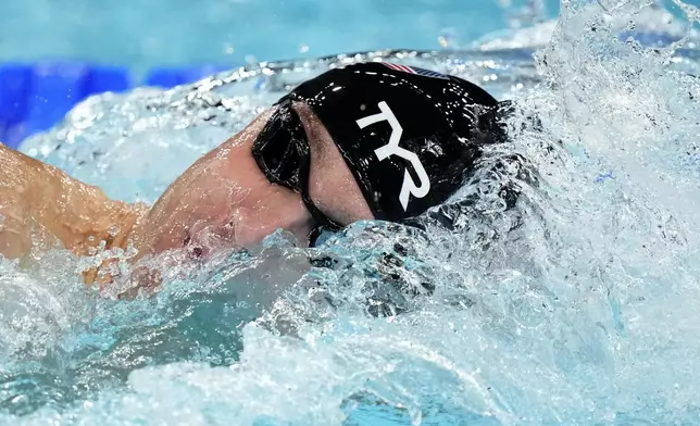 United States' Bobby Finke competes in the men's 1500-meter freestyle final at the Summer Olympics in Nanterre, France, Sunday, Aug. 4, 2024. (AP Photo/Brynn Anderson)