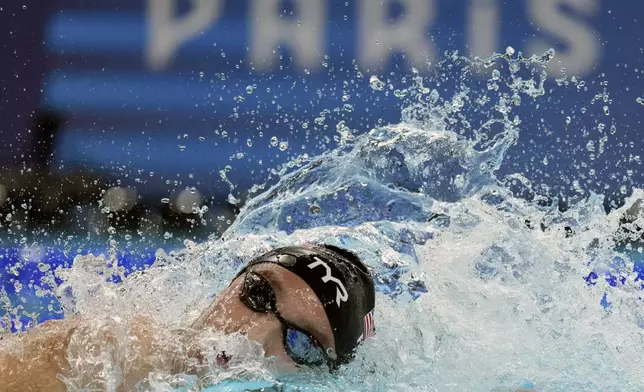 United States' Bobby Finke competes in the men's 1500-meter freestyle final at the Summer Olympics in Nanterre, France, Sunday, Aug. 4, 2024. (AP Photo/Natacha Pisarenko)