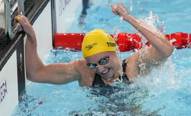 Australia's Ariane Titmus celebrates after the Australian women's 4x200-meter freestyle relay team won a gold medal at the 2024 Summer Olympics, Thursday, Aug. 1, 2024, in Nanterre, France. (AP Photo/Tsvangirayi Mukwazhi)