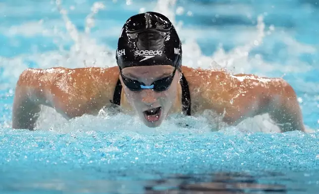 Summer McIntosh, of Canada, competes in the women's 200-meter butterfly final at the 2024 Summer Olympics, Thursday, Aug. 1, 2024, in Nanterre, France. (AP Photo/Matthias Schrader)