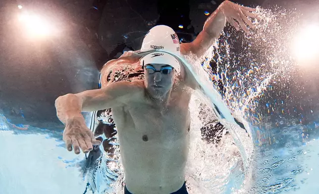 Jack Alexy, of the United States, competes during a heat in the men's 100-meter freestyle at the 2024 Summer Olympics, Tuesday, July 30, 2024, in Nanterre, France. (AP Photo/David J. Phillip)