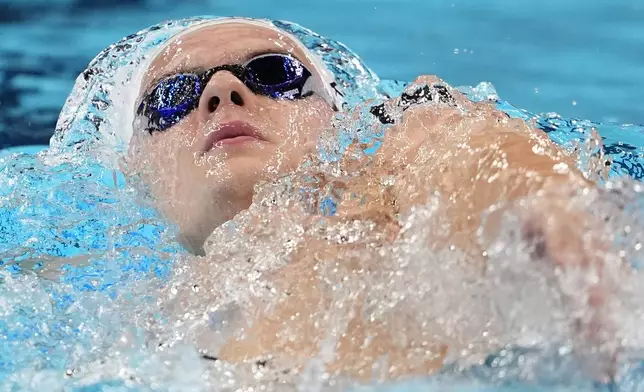 Hubert Kos, of Hungary, competes in the men's 200-meter backstroke final at the 2024 Summer Olympics, Thursday, Aug. 1, 2024, in Nanterre, France. (AP Photo/Matthias Schrader)