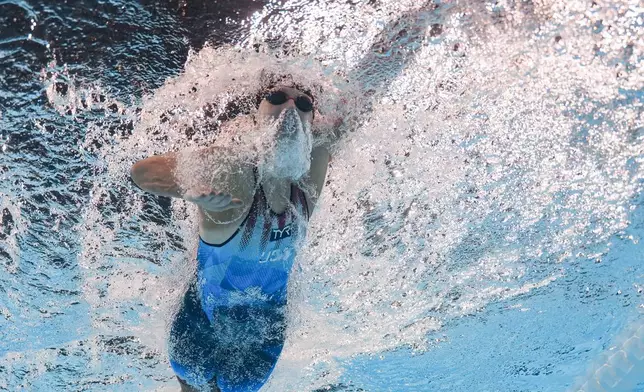 Katie Ledecky, of the United States, competes in the women's 400-meter freestyle final at the 2024 Summer Olympics, Saturday, July 27, 2024, in Nanterre, France. Ledecky finished third. (AP Photo/David J. Phillip)